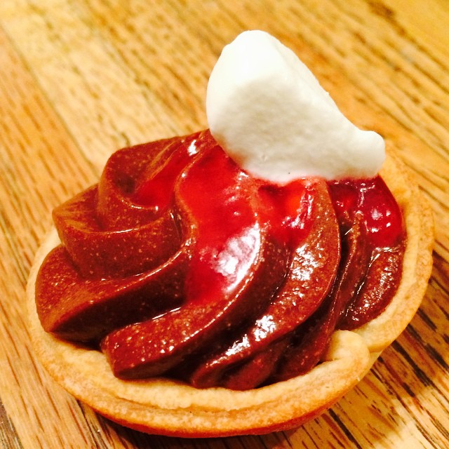 Chocolate mousse tartlet, raspberry coulis with Mexican vanilla whipped cream