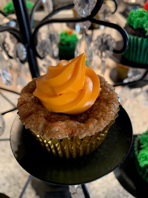 Carrot Cake cupcake with maple cream cheese frosting