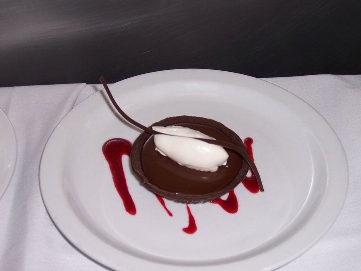 Chocolate mousse tart, raspberry coulis