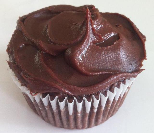 Devil's food cupcake with raspberry filling topped with raspberry chocolate ganache