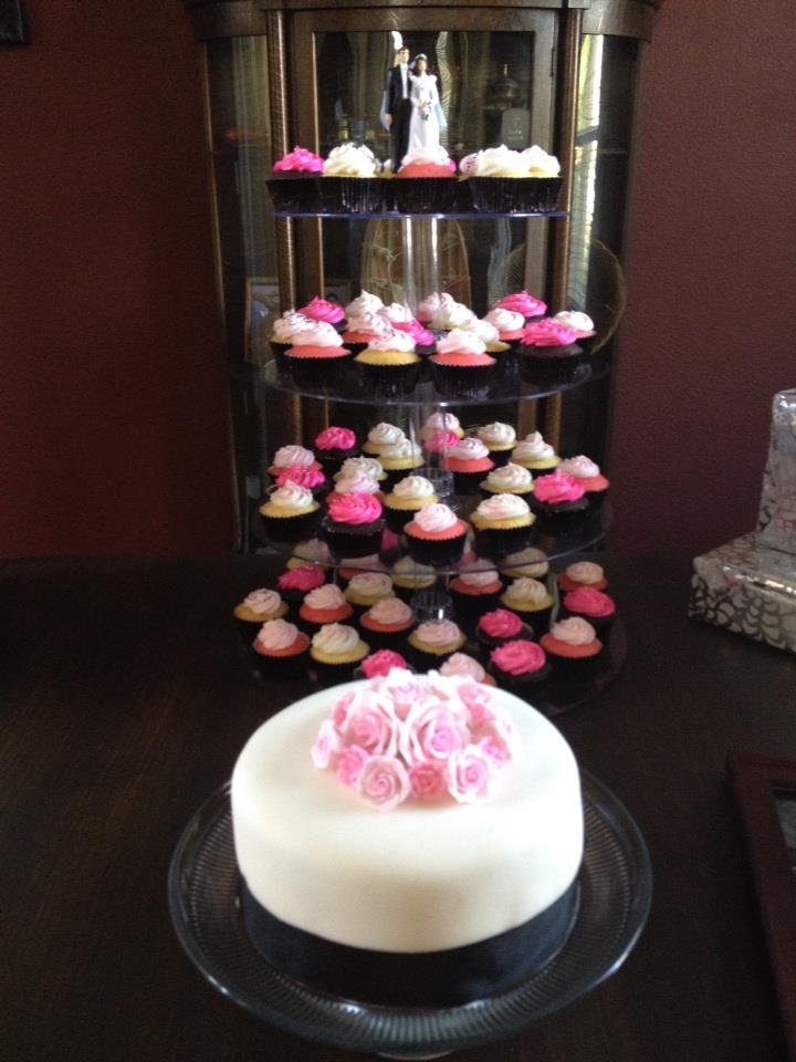 French vanilla cake with raspberry jam filling raspberry buttercream with assorted raspberry themed cupcakes